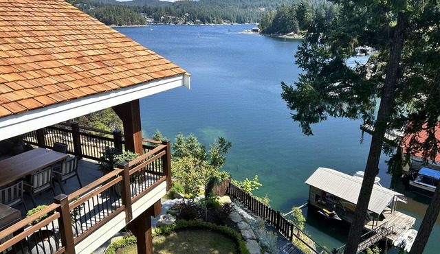 Beautiful waterfront home with private dock, fire pit and hot tub