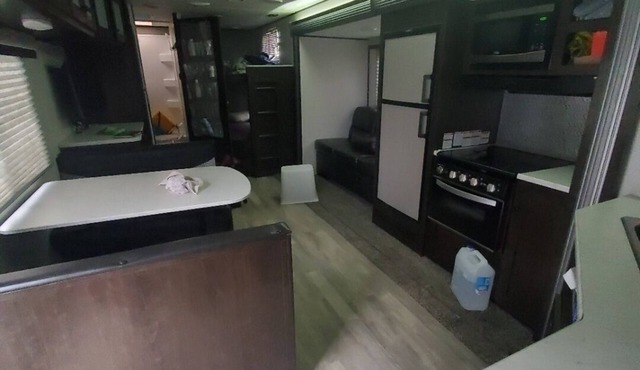 Camper sleeps up to 10, pets and atv friendly, backyard pool, local attractions