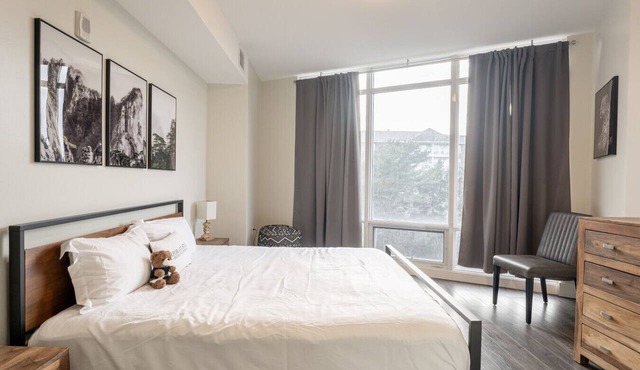 Chic 3BR Apt with City Views and Gym