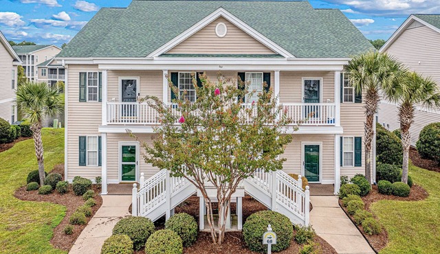 Coral Hideaway: Balcony | Pool | Dog Friendly