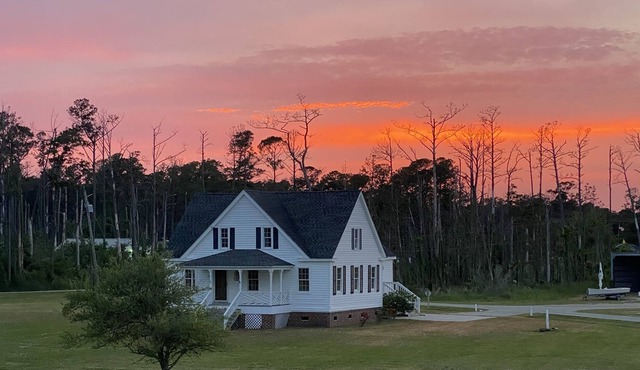 Core Sound Waterfront Cottage with boat ramp and dock on the property.