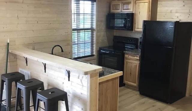 Cozy 1-bedroom cabin located at Gold & Blue Cabins in Bluefield