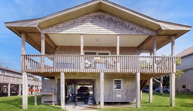 Dog-friendly, canal-front house with dock, balcony, deck, & central AC