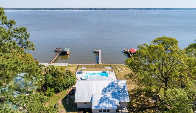 Fully renovated 1959 lake front cottage. In-ground swimming pool and spa.