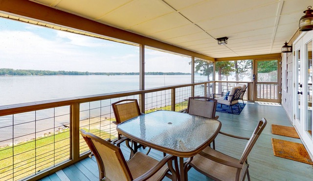 Lakefront home on large lot with dock, boat ramp, & gorgeous views