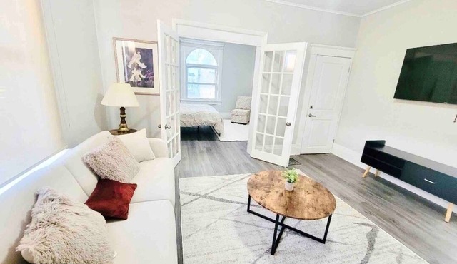 Mid century apartment with private backyard and deck
