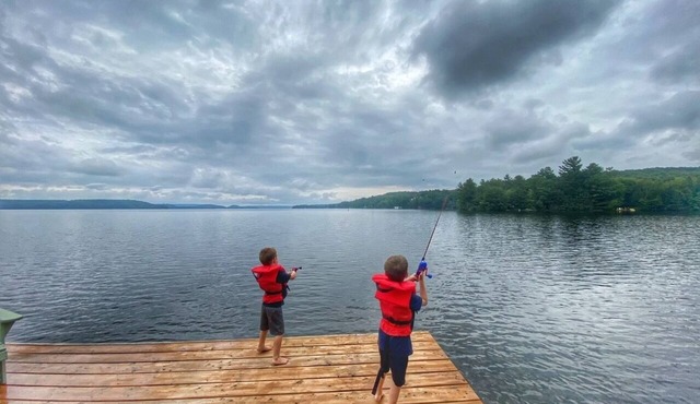 Modern farmhouse new build classic Muskoka cottage on Lake of Bays