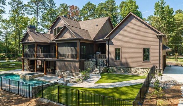 Newly constructed luxury retreat on Lake Thurmond. The sleeping arrangements for this property are 3 queen beds.