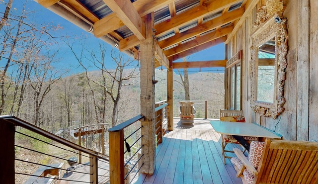 One-of-a-kind cabin with year-round lake & waterfall views, rustic outdoor tub