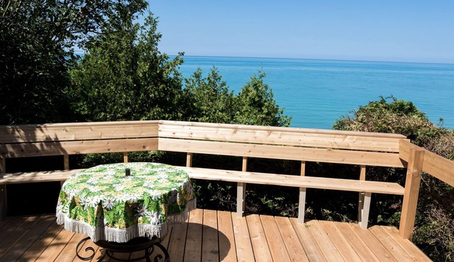 Peach of a private beach! Waterfront cliff cottage near Bayfield