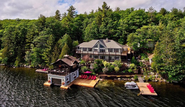 Priceless views at this 4 bed, 3 bath cottage + bunkie + boathouse!