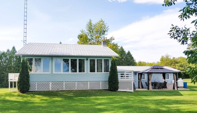 Private multi-family, fully stocked cottage on Graham Lake with large front lawn