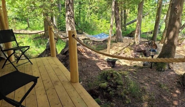 Riverside Retreat waterfront Luxury Glamping King size bed and very private