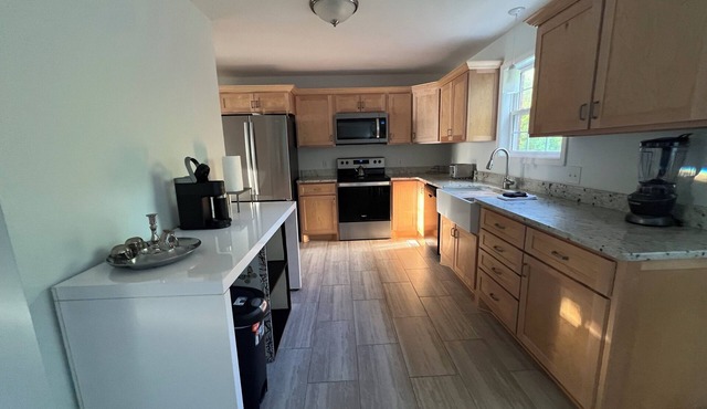 Spacious home near grocery store, interstate, etc, but also away from the crowd.
