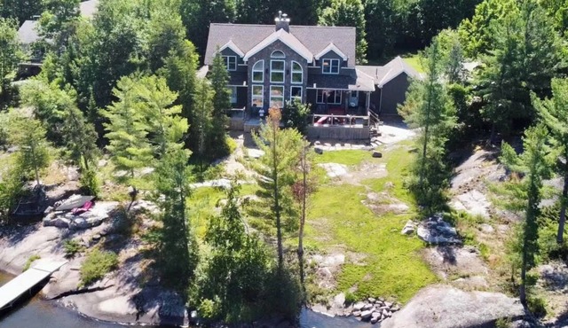 Spectacular Waterfront Escape: Experience Timber Frame Tranquility
