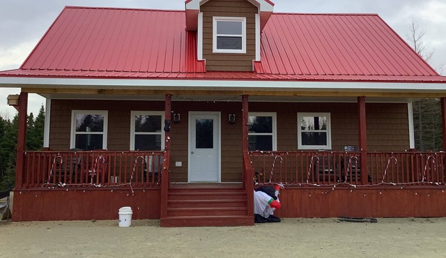 The house with the red roof