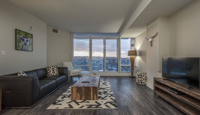 Urban 1BR Apt with Skyline Views, On-Site Theater