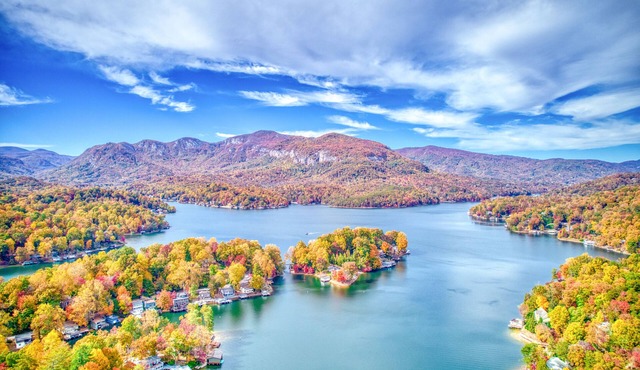 Vintage lakefront mountain home with boat house, dock, firepit & fireplace
