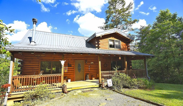 “Wake Up to Bison Views – Cozy Log Cabin on a 65-Acre Private Ranch.”