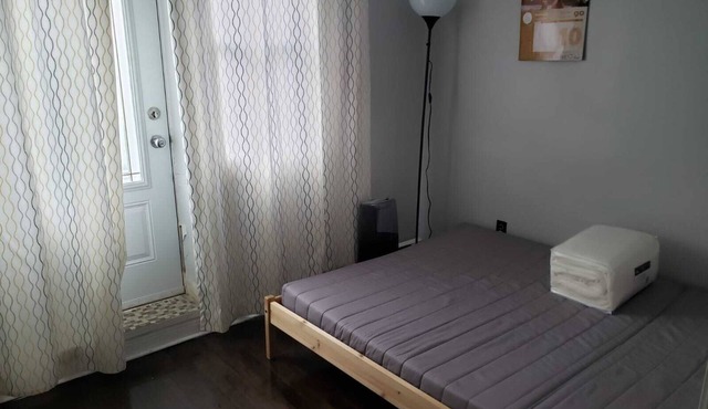 Warm apartment with a bus stop at its doorstep