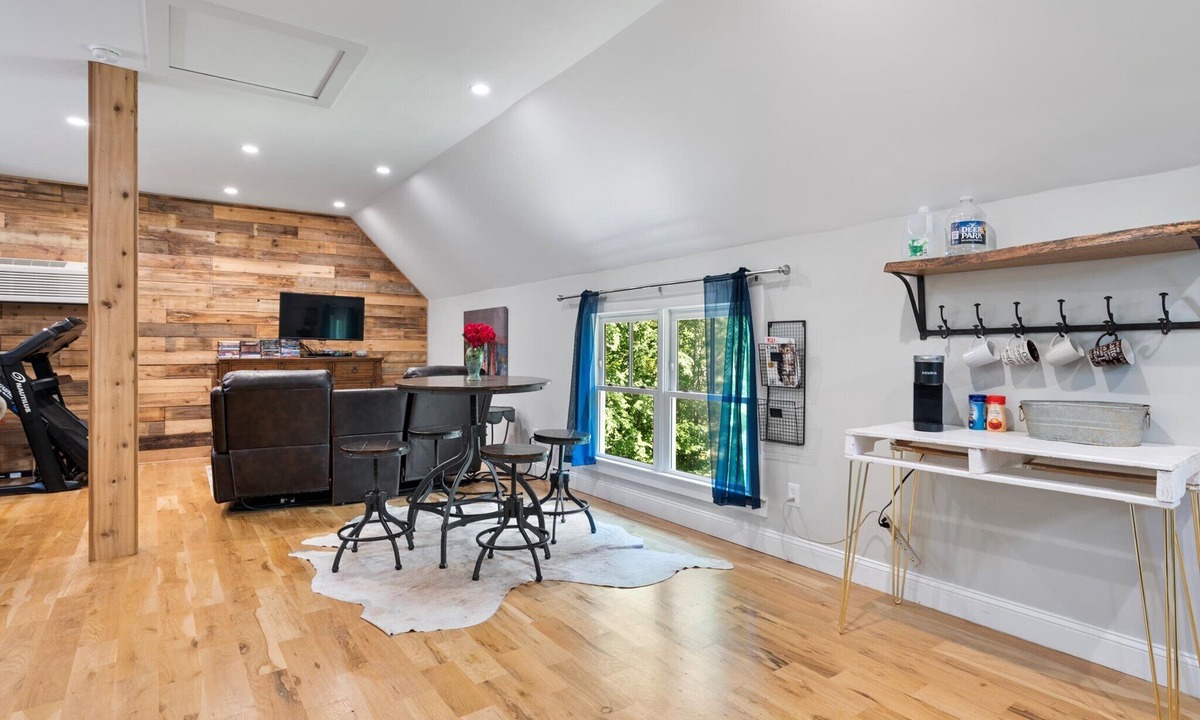 Matthews House | Studio above a detached garage away from main house on a private lot.