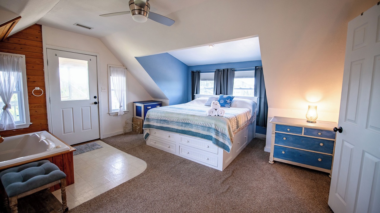 Photo of Bedroom in Wind Over Waves