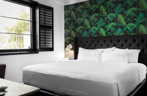 Sobro Cottage | Sleeps 8 4 Sobro Suites w/Kitchens & Modern Touches by Avantstay