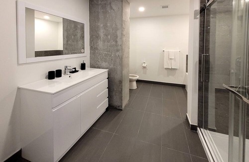 Fabreville Apartment | Corporate Stays -Relax & unwind with 1BR exclusive amenities with Rooftop Access