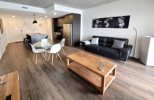 Fabreville Apartment | Corporate Stays -Relax & unwind with 1BR exclusive amenities with Rooftop Access