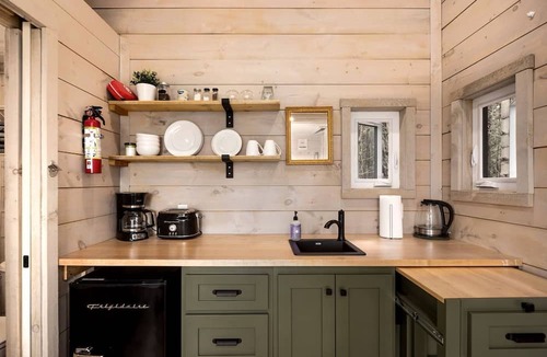 Desboro House | Cozy Getaways in Canada, in this Charming Tiny House with Fire Pit in Ontario