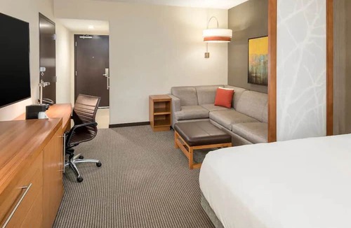 Greenville Downtown Apartment | King Comfort x2: Free WiFi, Indoor Pool, Steps from Bon Secours Arena