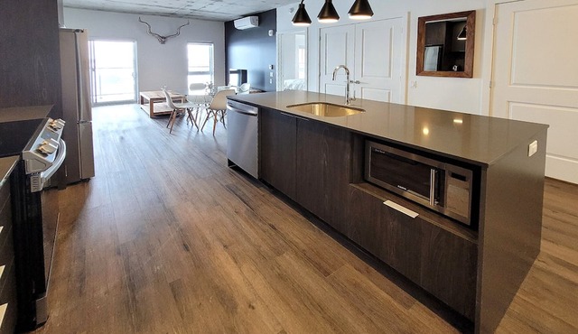 Corporate Stays -Relax & unwind with 1BR exclusive amenities with Rooftop Access