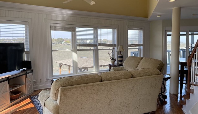 Folly Beach Riverfront Apt with dock, private boat ramp kayaks and bikes