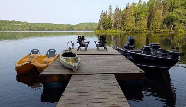 Lakefront log cabin with private dock