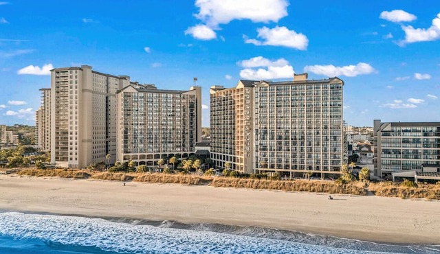 Oceanfront Condo Balcony with Resort Pool Hot Tub