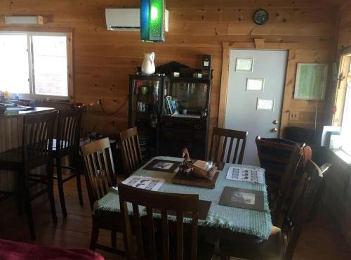 Charming Lakefront Cabin Rental with a Fire Pit near Brownville, Maine